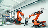 Рекламу немецкой газеты сняли промышленные роботы