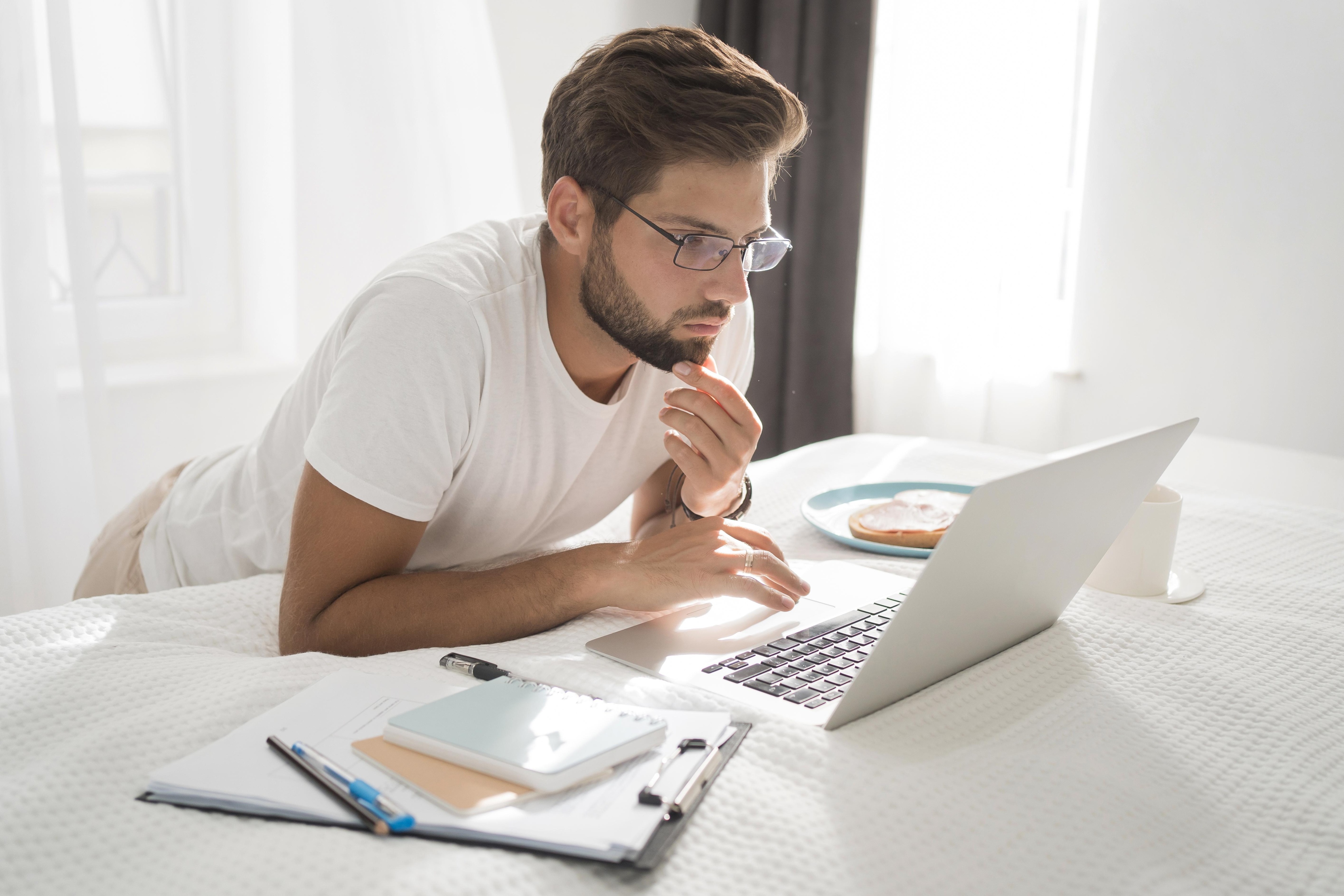 casual-adult-male-enjoying-working-home.jpg casual-adult-male-enjoying-working-home.jpg